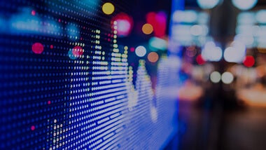 Blurry stock exchange graph with colored circles 