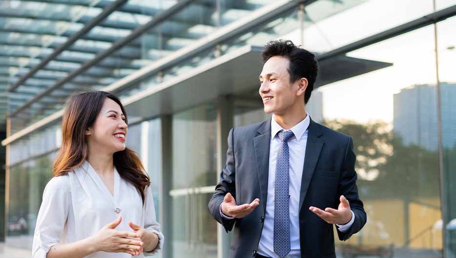 man and woman talking